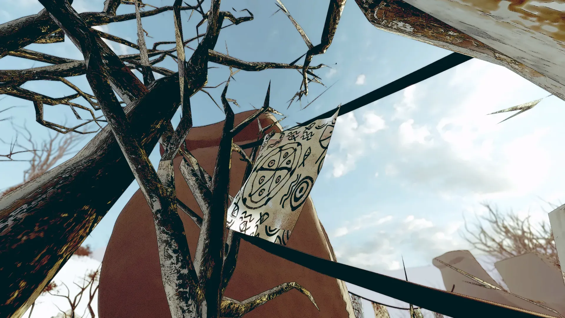 A flag with a circular shamanic pattern hanging among bare branches near a clay statue
